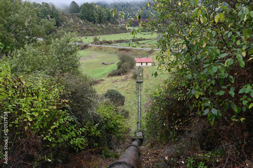 The penstock leading to the Six Mile hydro power station photo