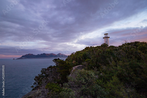 white lighthouse at the freycinet national park Tasmania Australia