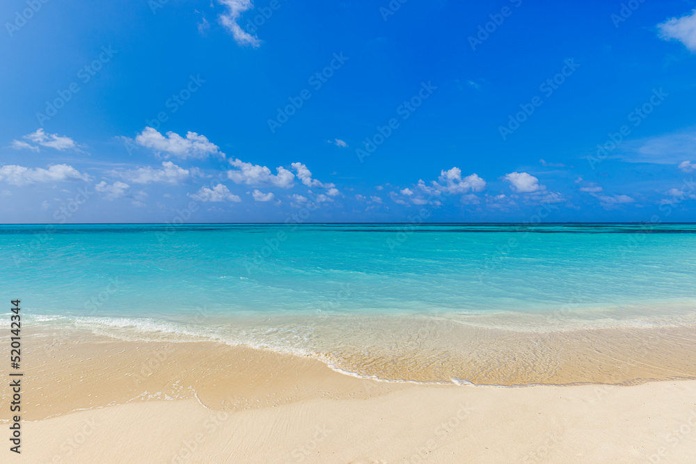 Summer vacation, holiday background of a tropical beach and blue sea and white clouds with relaxing waves. Seascape horizon, tranquil summer background. Travel scenic, exotic coast, shore landscape