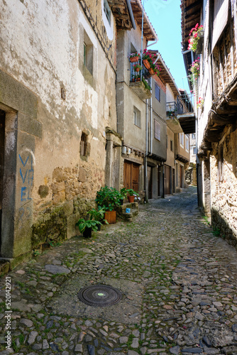Fototapeta Naklejka Na Ścianę i Meble -  Narrow cobbled streets of, La Alberca, a small town in Spain. It was the first Spanish town declared a Historic-Artistic Site, in 1940.