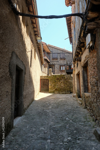 Fototapeta Naklejka Na Ścianę i Meble -  Narrow cobbled streets of, La Alberca, a small town in Spain. It was the first Spanish town declared a Historic-Artistic Site, in 1940.