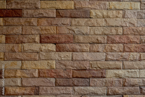 Brown brick wall as for abstract background.