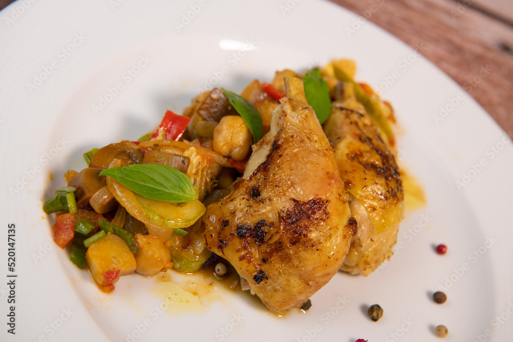 Recipe for grilled basquaise chicken with vegetables in ratatouille. High quality photo Recipe for grilled basquaise chicken with vegetables in ratatouille. High quality photo