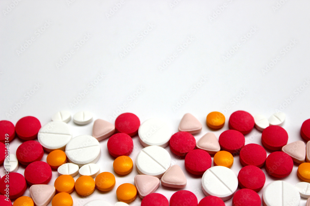 Several kinds of drug tablet isolated on the white background with copy space on the top Several kinds of drug tablet isolated on the white background with copy space on the top