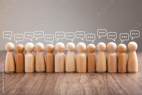 Tableau sur toile Wooden figurine with speech bubble