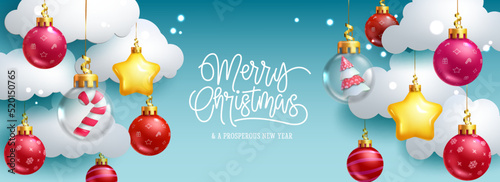 Christmas decoration vector background design. Merry christmas text with hanging balls decoration in clouds element for holiday season greeting. Vector illustration.
