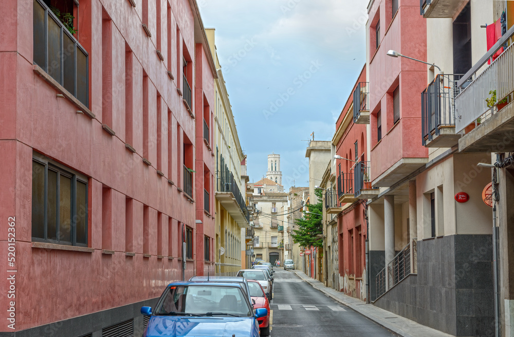 Obraz premium Buildings along Carrer Rentador street in Figueres, Catalonia, Spain.