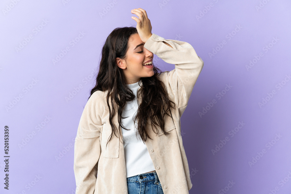 Young caucasian woman isolated on purple background has realized something and intending the solution Young caucasian woman isolated on purple background has realized something and intending the solution