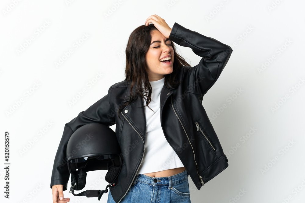 Woman holding a motorcycle helmet isolated on white background has realized something and intending the solution Woman holding a motorcycle helmet isolated on white background has realized something and intending the solution
