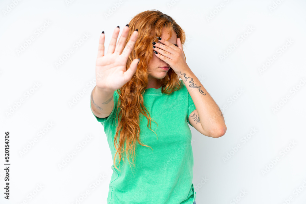 Young caucasian woman isolated on white background making stop gesture and covering face Young caucasian woman isolated on white background making stop gesture and covering face