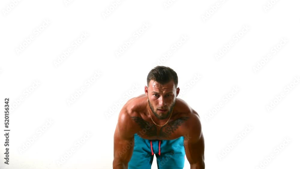 Muscular sexy shirtless man exercising back with dumbbells, isolated on white. Muscular sexy shirtless man exercising back with dumbbells, isolated on white.