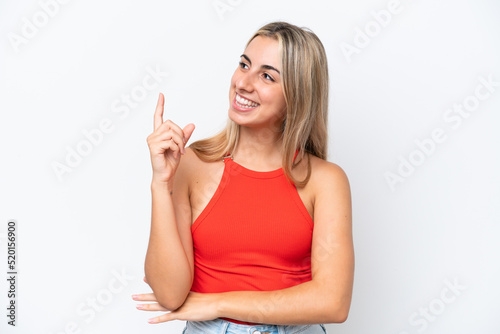 Young caucasian woman isolated on white background pointing up a great idea