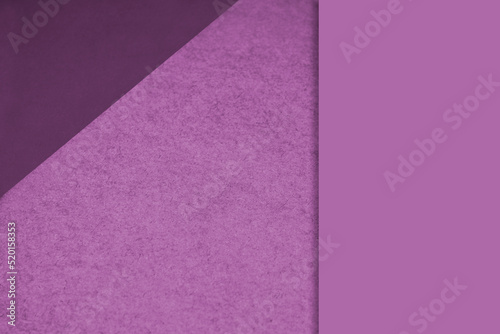 Textured and plain purple sheet papers forming two triangles and vertical blank rectangle for creative cover designing