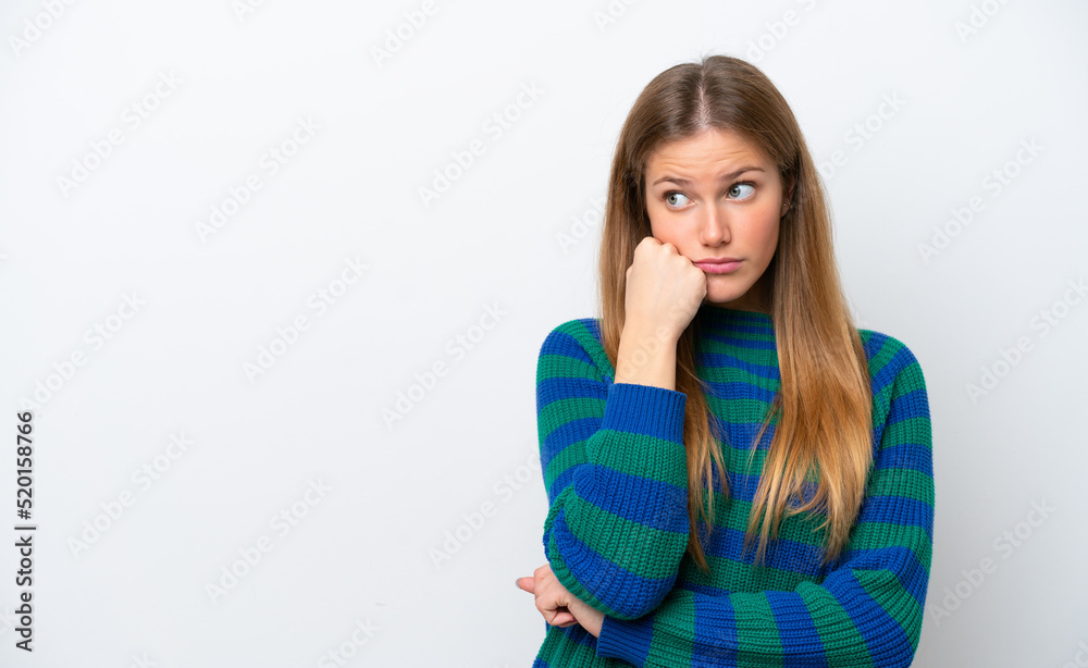 Young caucasian woman isolated on white background with tired and bored expression