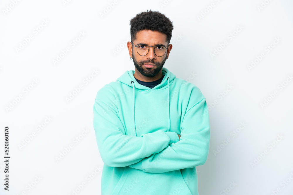 Fototapeta premium Young Brazilian man isolated on white background feeling upset