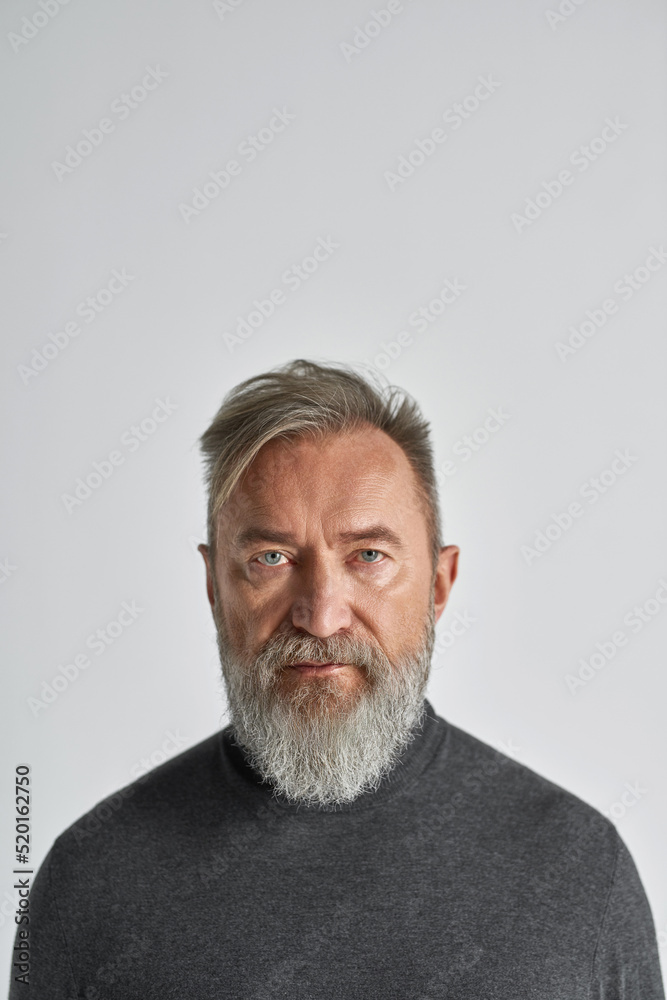 Portrait of senior caucasian man looking at camera Portrait of senior caucasian man looking at camera