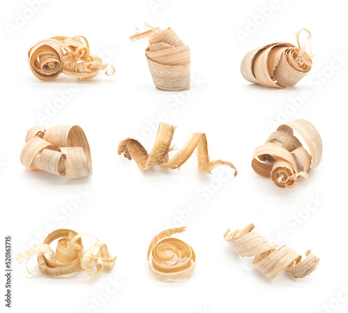 Set of curled wood shavings closeup isolated on white background photo