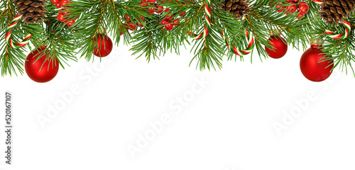 Christmas decorative top border with pine tree, red balls and berries, cones and candies isolated on white