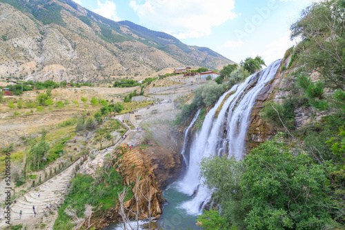 Tortum  Uzundere  waterfall from the side with people in Uzundere  Erzurum  Turkey