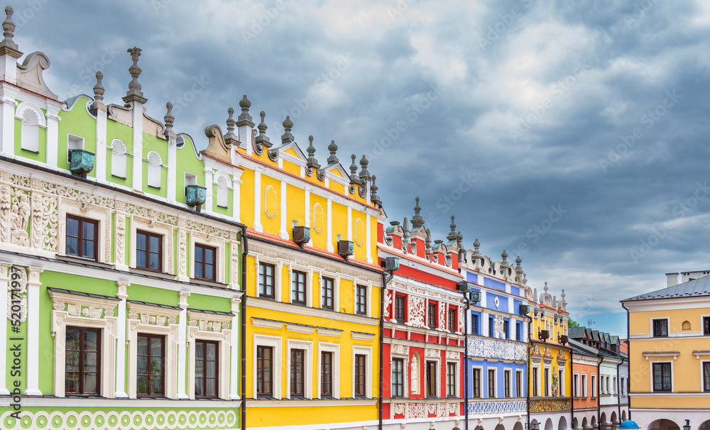 Fototapeta premium Armenian tenement houses on the market square in Zamość. Beautiful colorful buildings. Renaissance architecture. Zamość, Poland