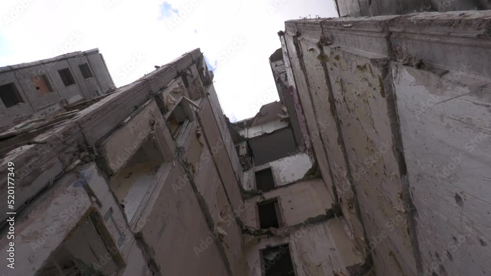 Chernigov, Ukraine, 2022: Destroyed residential building in as a result of shelling by the Russian army during the Russian-Ukrainian war Chernigov, Ukraine, 2022: Destroyed residential building in as a result of shelling by the Russian army during the Russian-Ukrainian war