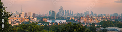 Aerial panoramic view of the most beautiful landmarks of London and the financial district across the River Thames in the Great Britain.