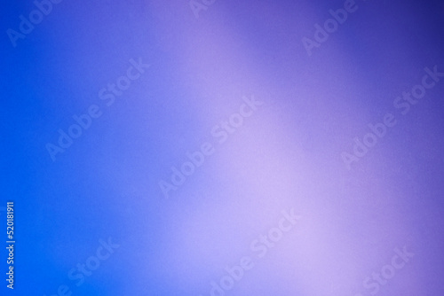 Illuminated light with gobo mask on purple  background.
