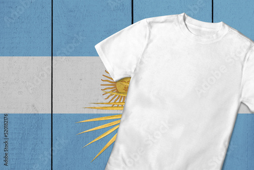 Patriotic t-shirt mock up on background in colors of national flag. Argentina