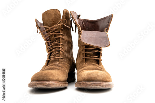 Old used leather Women's boots  isolated on white background.
