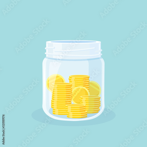 Savings. Glass money jar full of gold coins. Saving cash in moneybox. Growth, income, investment, wealth concept