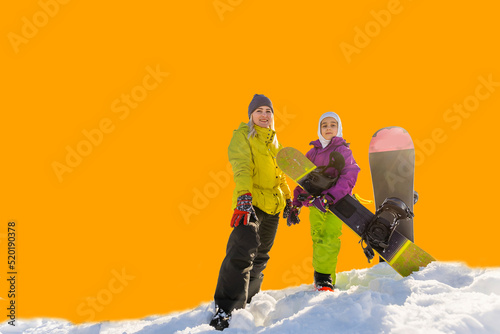 snowboard mother daughter on an orange background