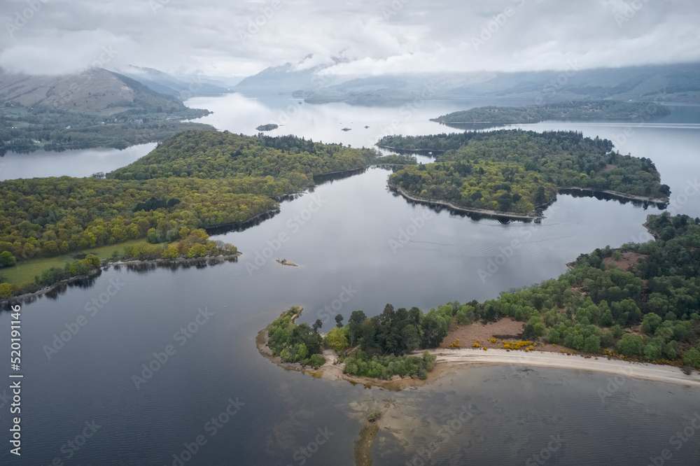 Loch Lomond aerial view showing islands Inchtavannach, Inchconnachan, Inchcruin and Inchfad