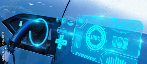 electric vehicle charging station with power cable supply plugged at station with graphic display diagram, EV charging station, green energy, blue power, electric energy, technology and EV Car concept