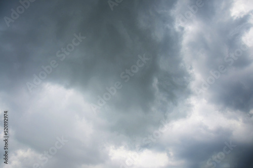 View landscape dark cloudscape of sky and beautiful storm raining clouds in day time at nonthaburi countryside rural of bangkok city in thailand