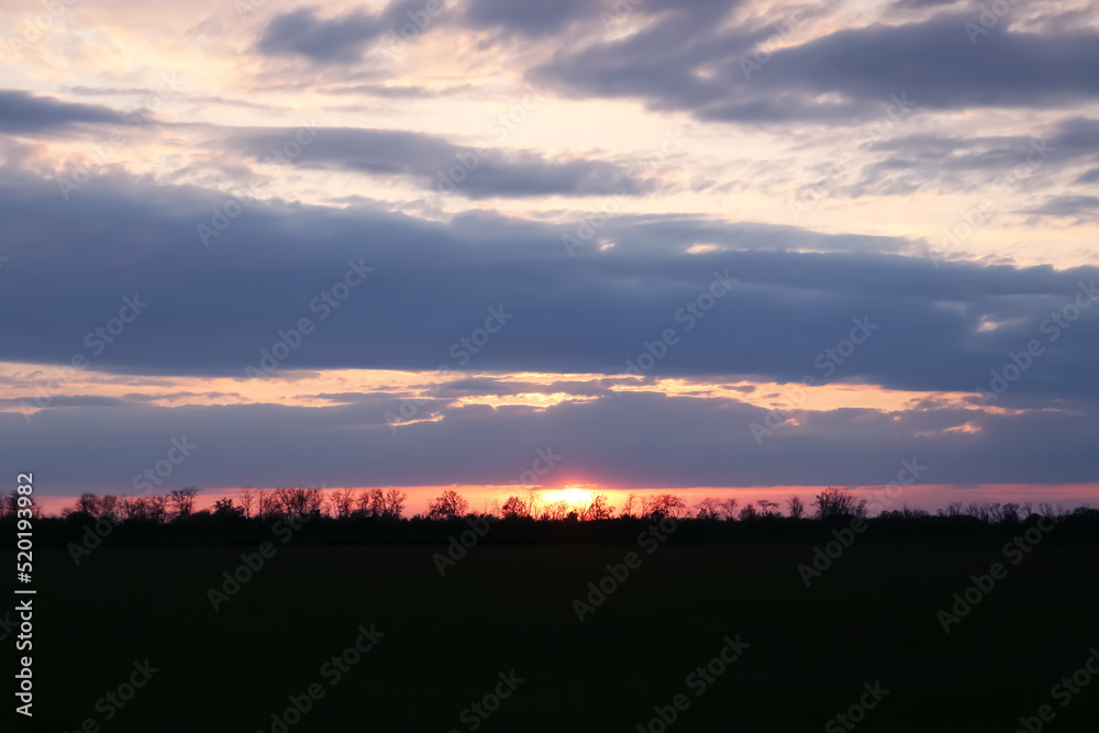 Fototapeta premium Picturesque view of beautiful countryside at sunset