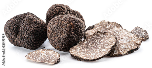 Black winter truffles and truffle slices on white background. The most famous of the trufflez.