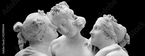 The Three Graces, Le tre Grazie. Neoclassical sculpture, in marble, of the mythological three charites isolated on black background photo