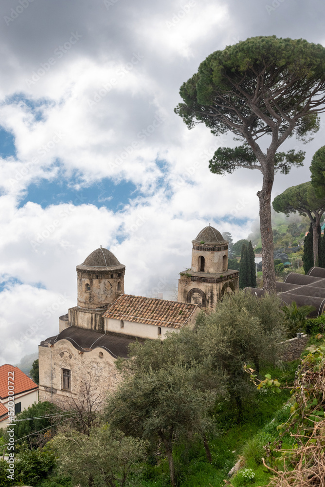 RAVELLO, ITALY - APRIL 31 2022 - Scenic sky over the famous park of the Villa Rufolo RAVELLO, ITALY - APRIL 31 2022 - Scenic sky over the famous park of the Villa Rufolo