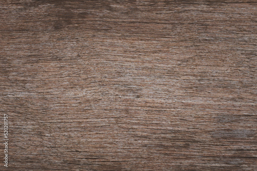 Dark brown wooden plank texture for background.