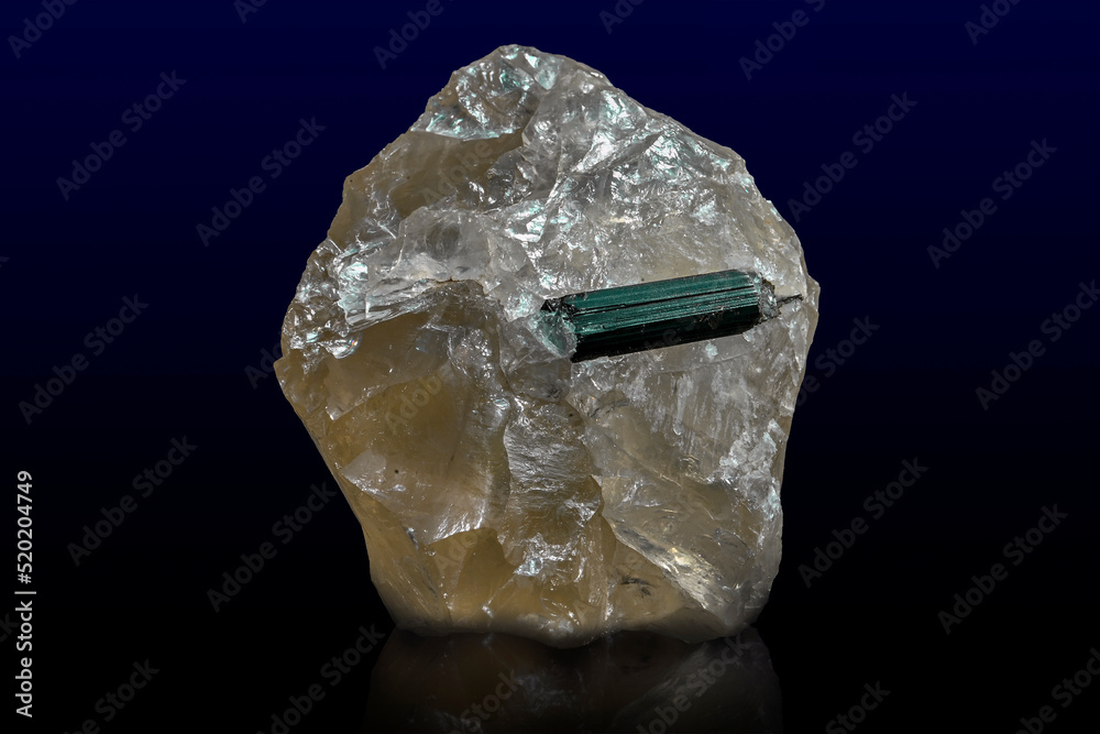 Raw quartz crystal, with black tourmaline inclusions