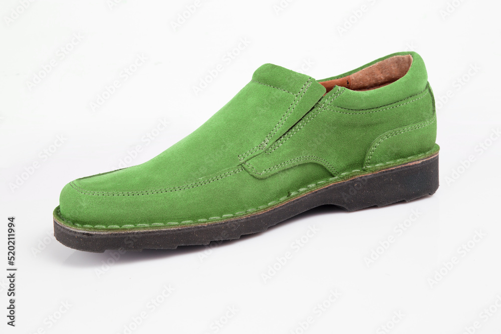 Male green leather shoe on white background, isolated product.