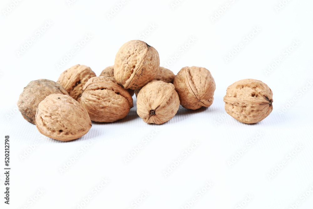 walnuts in the studio on a white background walnuts in the studio on a white background