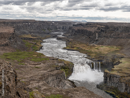 Aerial view of the waterfall Hafragilsfoss and the surrounding canyon Jokulsargljufur seen from the east bank of river Jokulsa a Fjollum  in northern Iceland