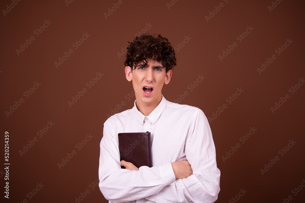 Young attractive guy with a book. Young attractive guy with a book.