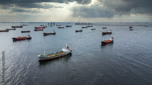 Aerial view oil and gas petrochemical tanker, Refinery industry cargo ship, Fuel global business transportation, Oil product tanker and LPG tanker at sea.