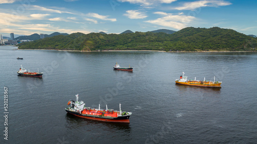 Aerial view oil and gas petrochemical tanker, Refinery industry cargo ship, Fuel global business transportation, Oil product tanker and LPG tanker at sea.