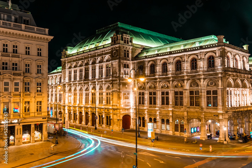Light trails in front of the Opera House at night in Vienna, Austria