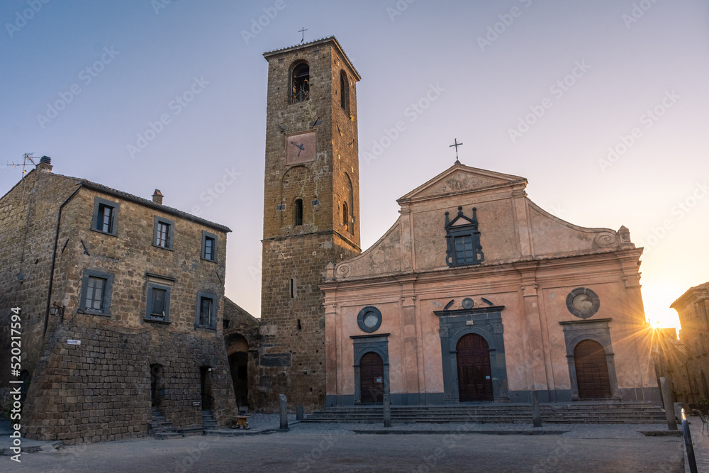 Beautiful sunrise on the church in the historic center of Civita di Bagnoregio. Lazio Italy