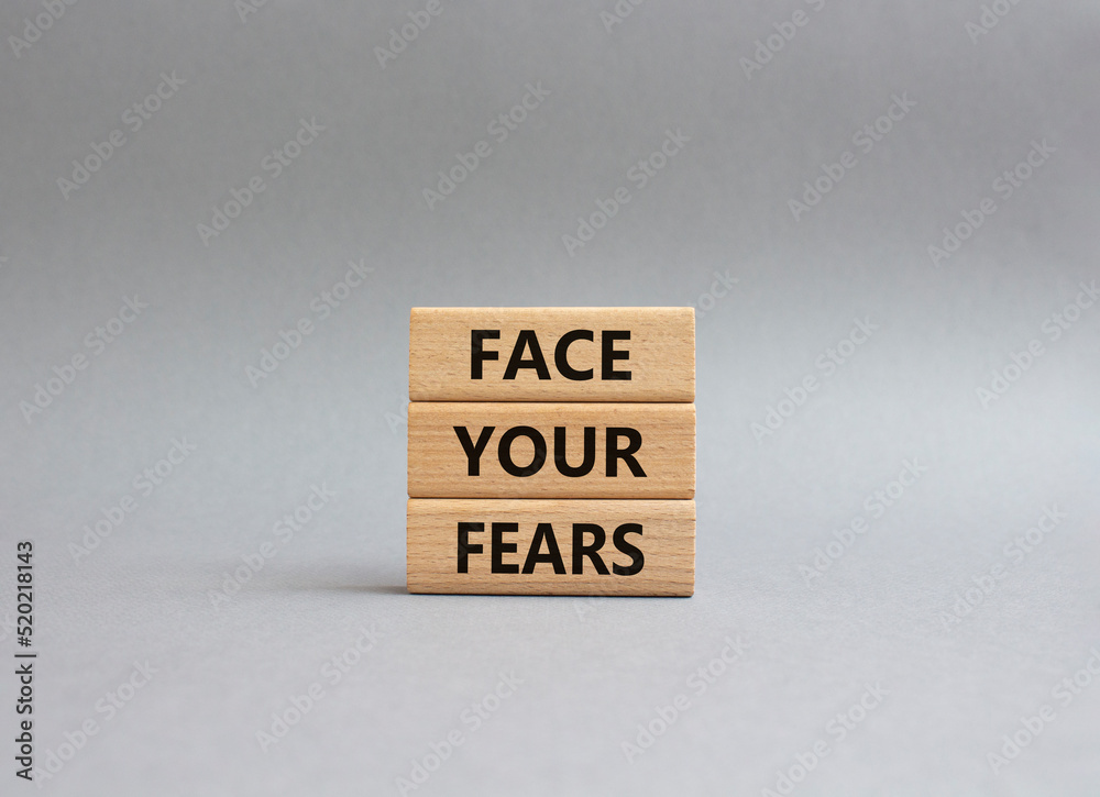 Face your Fears symbol. Wooden blocks with words Face your Fears. Beautiful grey background. Business and Face your Fears. Copy space. Face your Fears symbol. Wooden blocks with words Face your Fears. Beautiful grey background. Business and Face your Fears. Copy space.