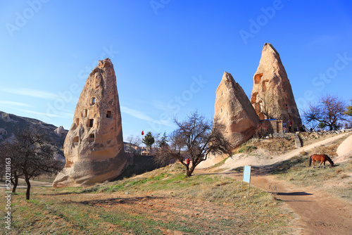Valley with old houses in the rocks in Uchisar, Cappadocia, Turkey 